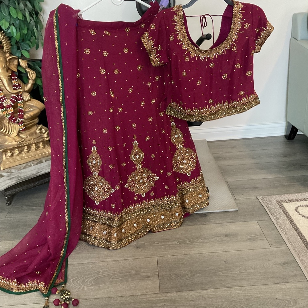 Embellished Fuchsia Pink Lehenga Choli Set with Gold Detail